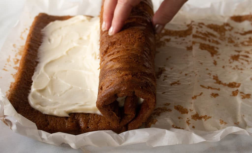 Rolling the filled Pumpkin Spice Cake